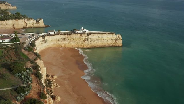 Aerial view of cliff with chapel Ermida de Nossa Senhora da Rocha