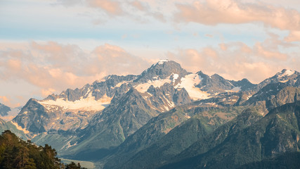 Sunset in the mountains of Arkhyz. Sunset sky mountain peaks. Mountain landscape.