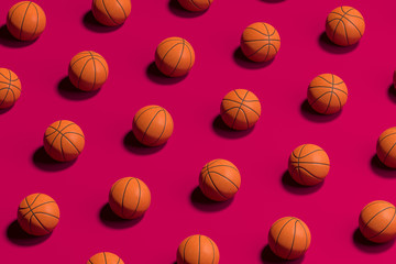Basketball Balls Isolated On Red Background. 3d Rendering