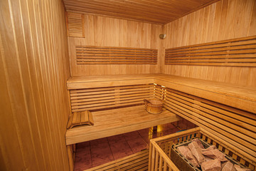 Fototapeta na wymiar Interior of a wooden sauna.