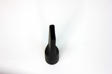 Black nozzle for vacuum cleaner on a white background. Carpet and floor purifier narrow parts and accessories.