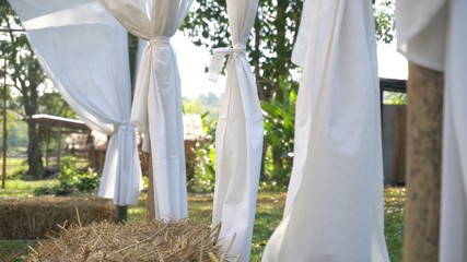 White cloth tied to bamboo In a natural atmosphere with a wind blowing