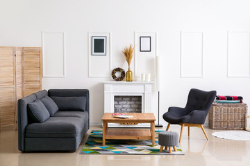 Interior of modern room with fireplace
