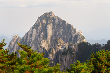 Fototapeta premium Jade Screen Tower with hotel and Heavenly City Peak from Brightness Top on Huangshan China
