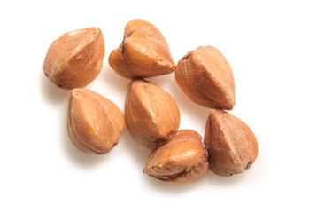 Raw buckwheat on white background