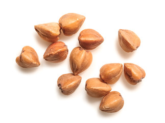 Raw buckwheat on white background