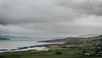 The waves of the ocean hit the rocks with small splashes