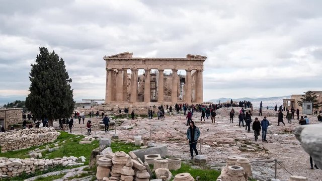 Athens, Greece, Europe - December 31 2019: time lapse tourists visiting Parthenon and Acropolis