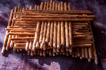 geometric still life of salty cookies straws