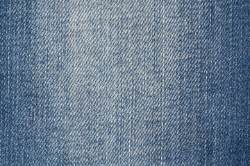 Textured striped blue jeans denim fabric background