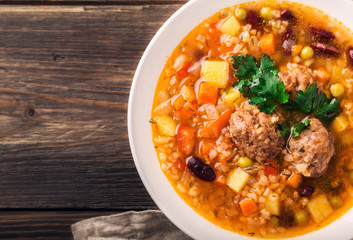 Homemade vegetable soup with meatballs