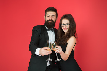 Get into holiday mood. Happy family celebrate Valentines day. Couple in love raise champagne glasses. Enjoying holiday party. Holiday celebration. Tasty holiday drink. Birthday anniversary