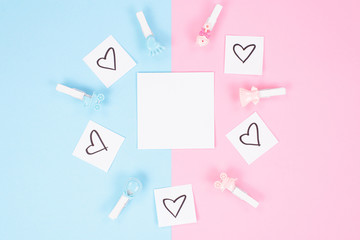 Twins concept. Close up top above high angle view photo of beautiful childish clothespins lying on isolated two colored background with blank sheet of paper