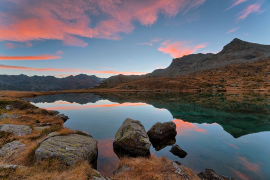 Sunset on the Muff&egrave; Lake in the park Mont Avic in Aosta Valley, Italy.