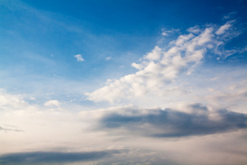 Beautiful evening blue sky with white clouds and gray clouds