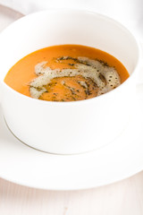 Winter spicy lentil cream soup on light airy background