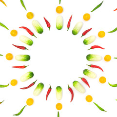 Top view flat lay over vegetables laid out in the form of a clock on a white background with copy space. Food design template food concept with culinary ingredients.