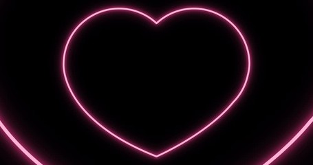 Pink neon heart.Valentine on black background.