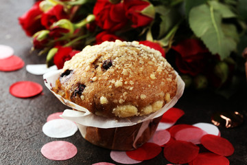 blueberry muffin on dark background for Valentine's day. tinting. selective focus for romatic day