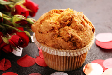  nut muffins on dark background for Valentine's day. tinting and roses
