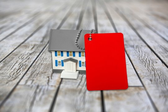 Classic house model with a red blank card