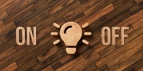 wooden lightbulb with the words ON and OFF on wooden background