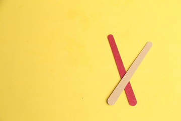 Nail file on colorful background