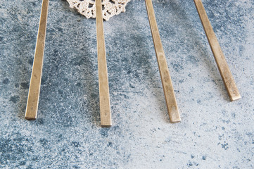 Old bronze cocktail spoons