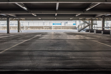 A grey, empty parking deck.