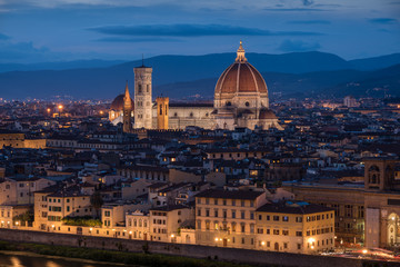 Florence panoramic view from above during blue hour with historical buildings Duomo churches and Ponte Vecchio