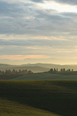 Naklejka na ściany i meble Foggy sunrise with typical landscape in Tuscany, Italy, Europe