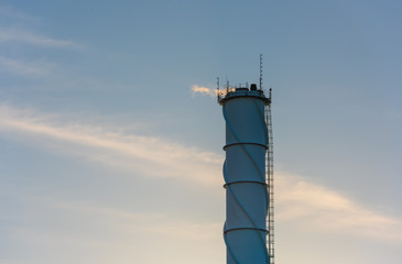 Tall large funnel of a heating plant.