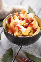 Canadian poutine potato fries with cheese and gravy