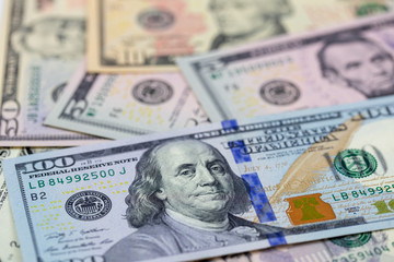 Business background, american dollars banknotes close up in studio macro photo