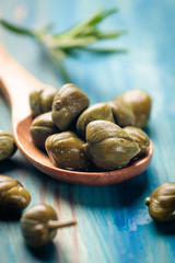 Pickled green capers close-up