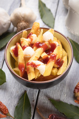 Canadian poutine potato fries with cheese and gravy