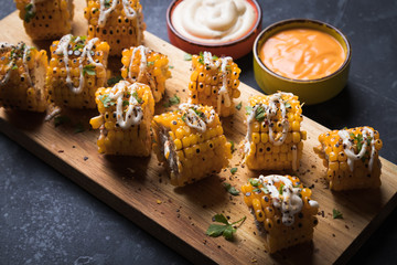 Grilled sweet corn slices
