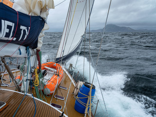 waves around yacht with view to cape Horn