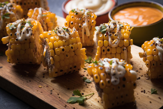 Grilled sweet corn slices