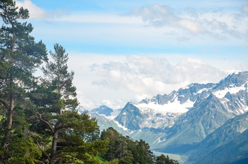 Fototapeta premium Sunny day in the mountains of Arkhyz. The Caucasus mountains with rocky peaks. Mountain landscape.