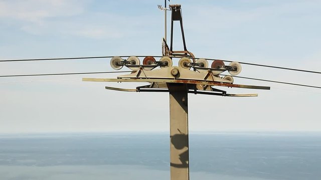 Close up of pylon and cable pulleys on the Llandudno aerial cable car ride to Great Orme summit