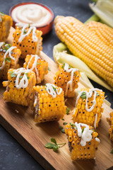 Grilled sweet corn slices
