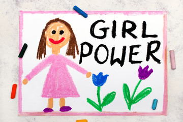 Photo of colorful drawing: Smiling young woman and hand drawn lettering phrase GIRL POWER