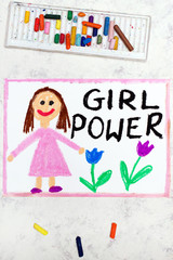 Obraz na płótnie Canvas Photo of colorful drawing: Smiling young woman and hand drawn lettering phrase GIRL POWER
