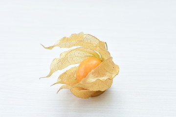 natural cape gooseberry on wooden background