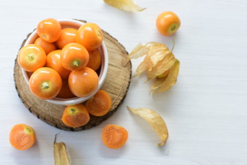 natural cape gooseberry on wooden background