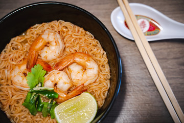 Spicy instant thai style noodles soup with shrimp (tom yum kung) 
