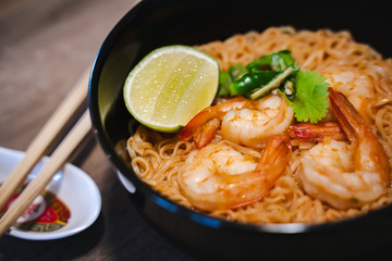 Spicy instant thai style noodles soup with shrimp (tom yum kung) 