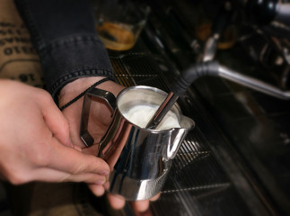 Making coffee in coffeeshop or cafe closeup