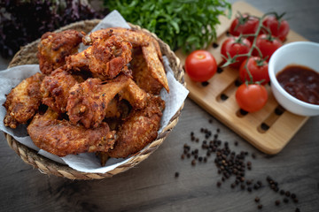 crispy fried chicken in the basket with salad